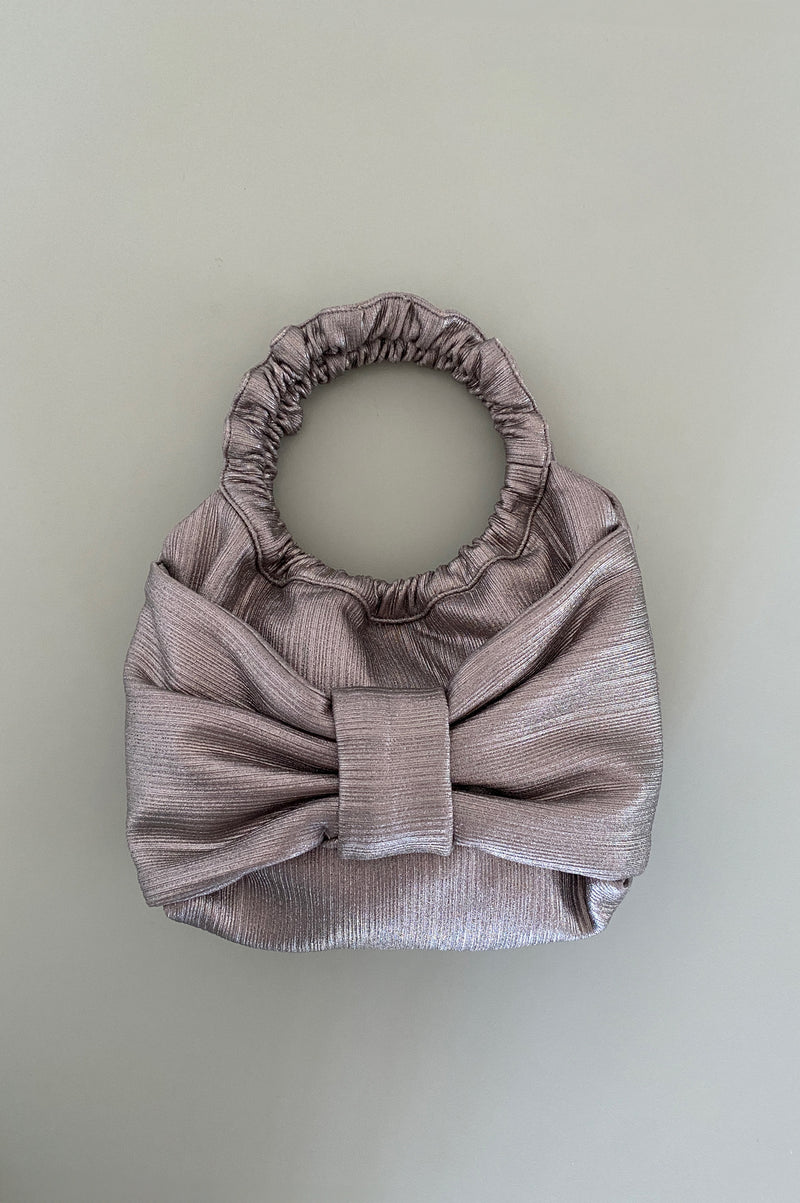 Ionic bow purse
