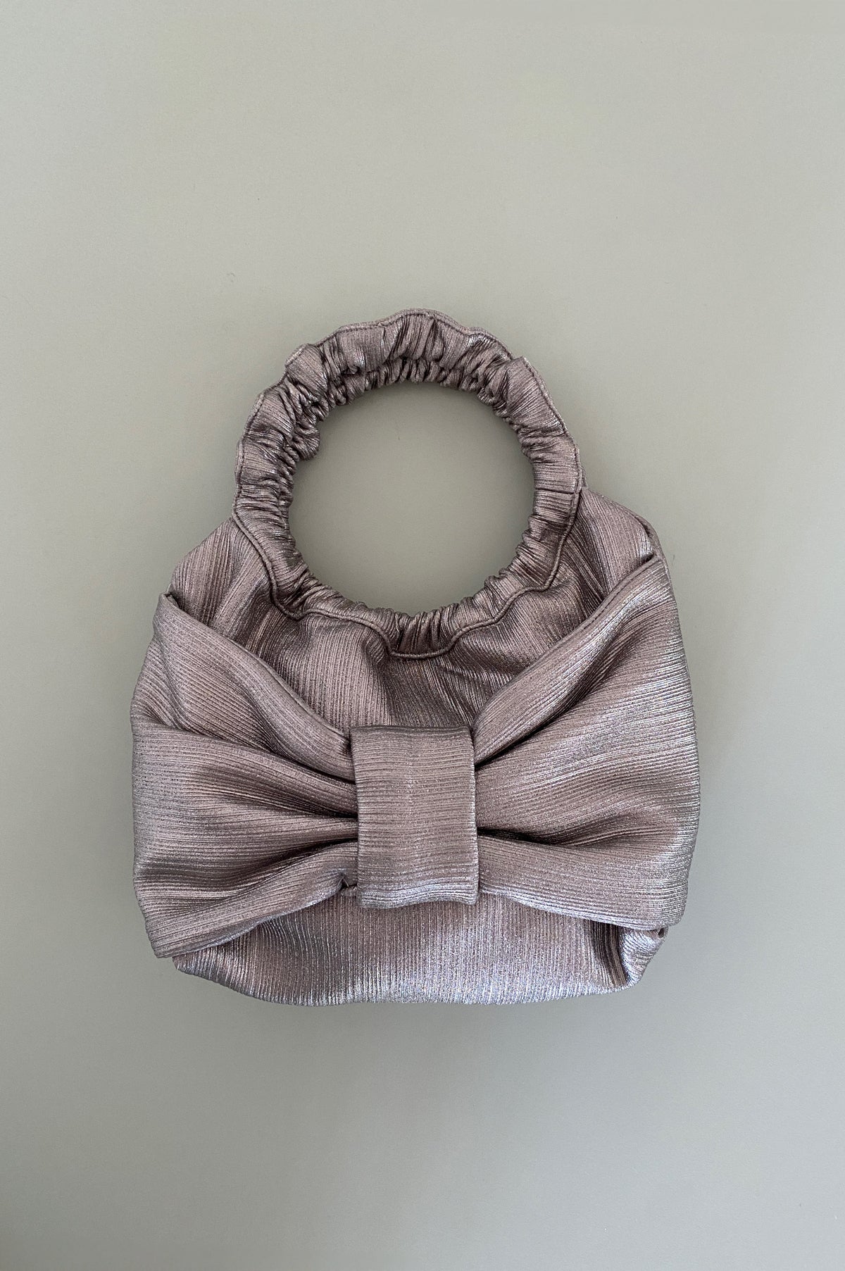 Ionic bow purse